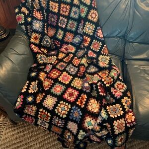 Multi-color HAND CROCHET granny square afghan with BLACK border. 44 X 72.